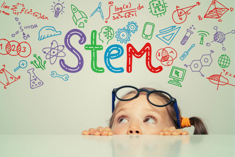 STEM word and symbols are doodled above a little girl who looks up at it.